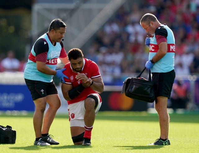 Taulupe Faletau (centre) lhas been ruled out of the World Cup after breaking an arm