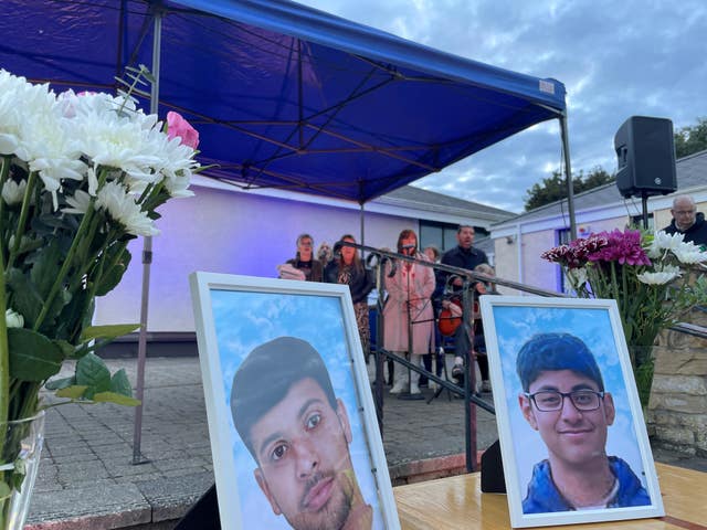 A folk group singing at the memorial