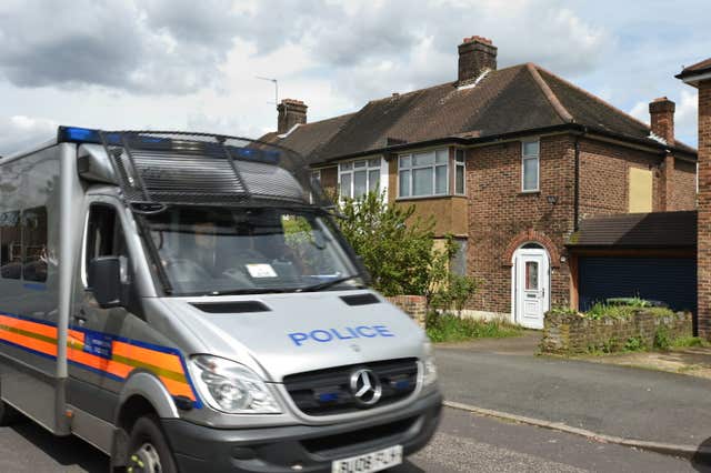 Police presence outside the home of Richard Osborn-Brooks in South Park Crescent (David Mirzoeff/PA)