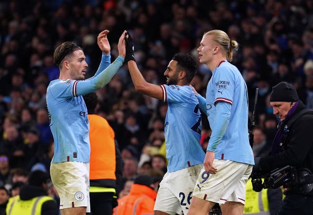 Manchester City celebrate scoring against Tottenham
