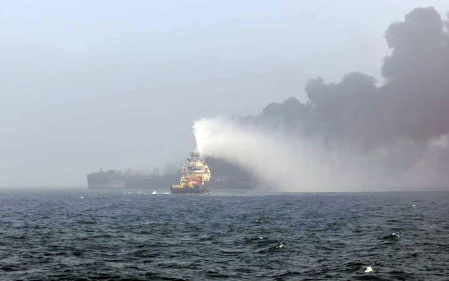 Smoke rising from the collision