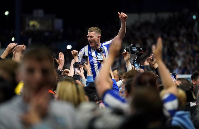 Sheffield Wednesday’s Michael Smith celebrates with fans after the Sky Bet League One play-off semi-final second leg match