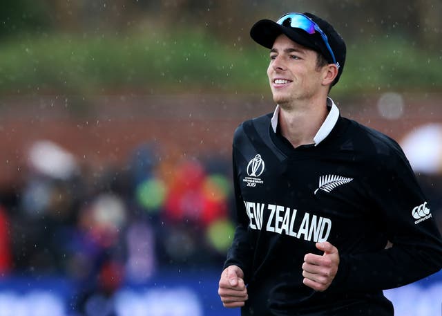 New Zealand’s Mitchell Santner runs off the pitch