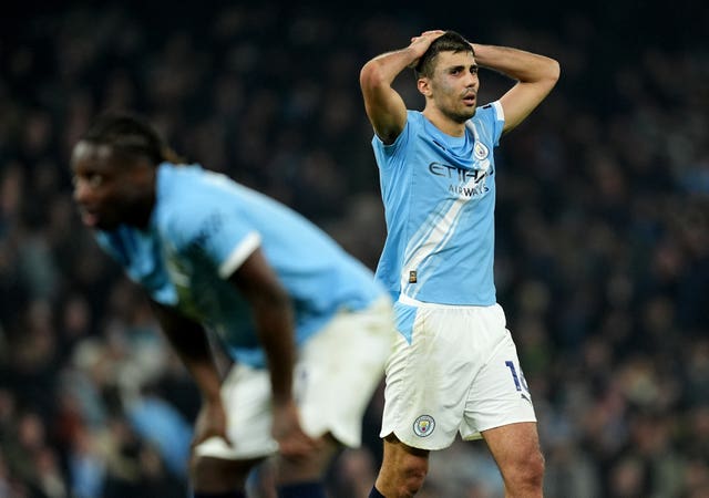 Manchester City’s Rodri (right) and Jeremy Doku (left) show their frustration after a draw against Nottingham Forest