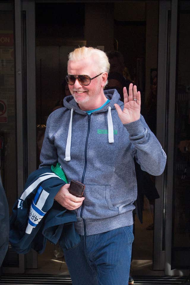 Chris Evans waving as he left the BBC