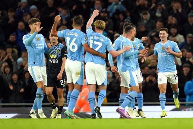 Manchester City celebrate scoring against Burnley