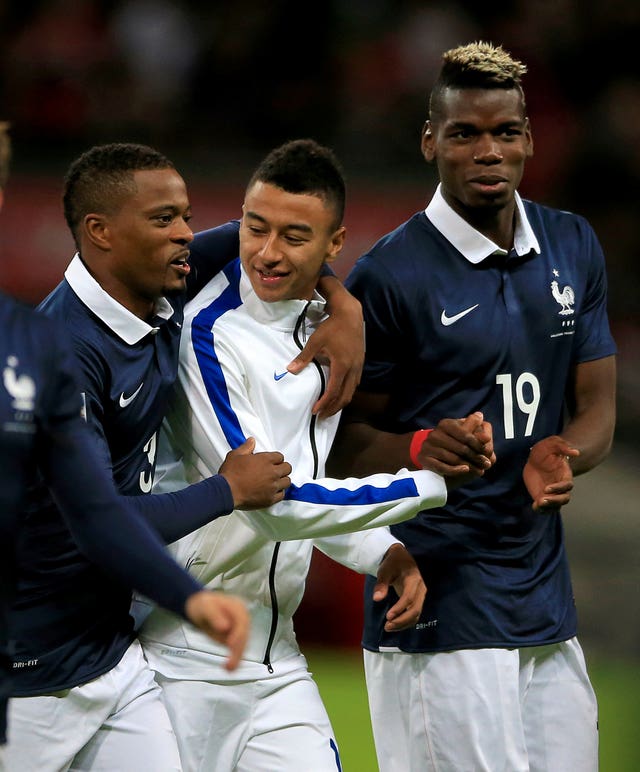 Paul Pogba, right, regularly speaks with compatriot Patrice Evra, left