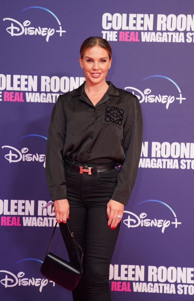 Danielle Lloyd posing on a red carpet