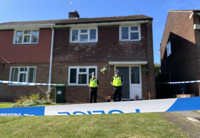 Police officers at the scene in Lovett Avenue, Oldbury after a 13-year-old boy has been stabbed to death at a house, sparking a murder investigation