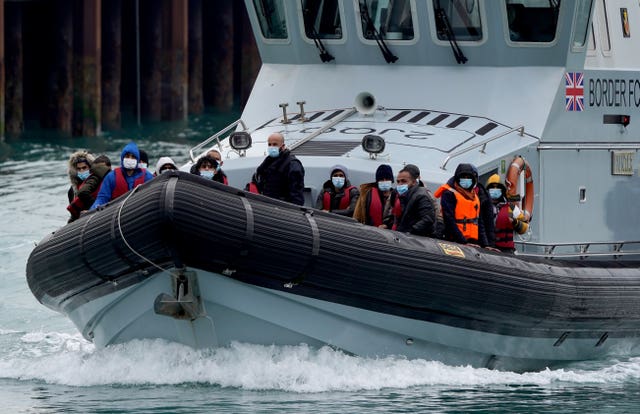 A group of people thought to be migrants are brought in to Dover, Kent, onboard a Border Force vessel following a small boat incident in the Channel on Wednesday 