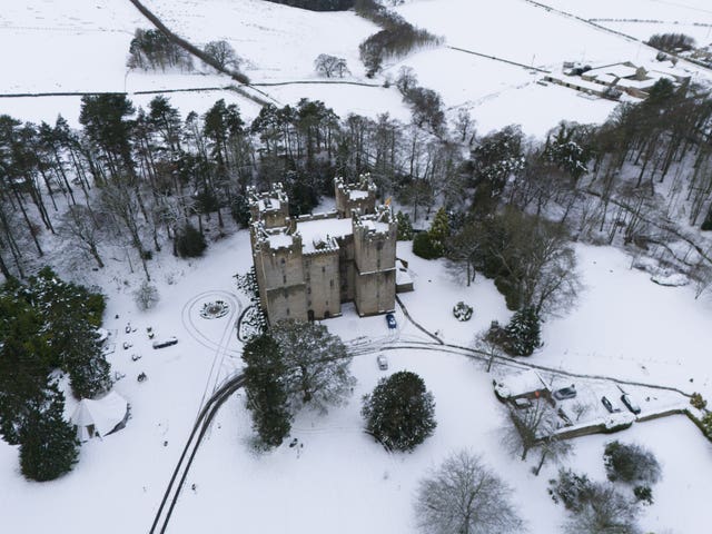 Snow surrounds the Langley Castle Hotel in Langley, Hexham, Northumberland 