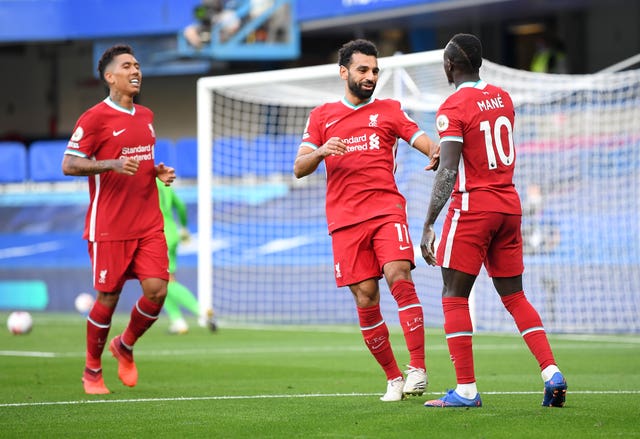 Liverpool's front three of Roberto Firmino, Mohamed Salah and Sadio Mane celebrate a goal