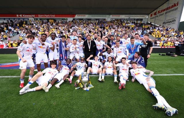 The Leeds players with the trophy
