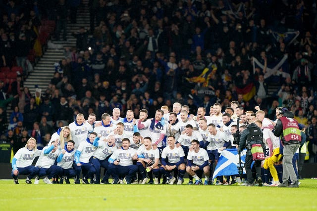 Scotland players celebrate qualifying for Euro 2024 