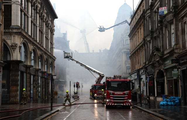 Fire crews work outside Glasgow Central station