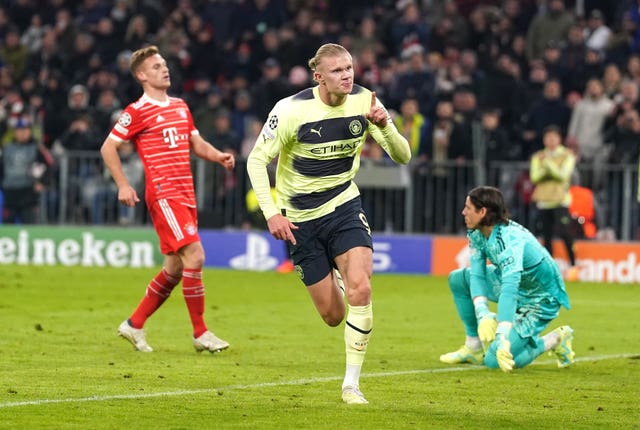 Erling Haaland celebrates scoring against Bayern Munich