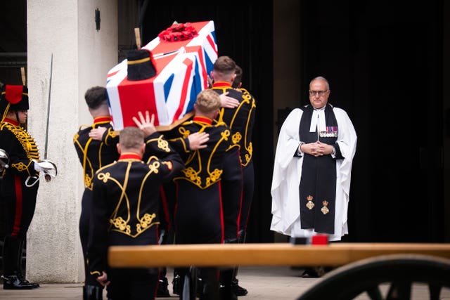 The coffin of Lance Bombardier Ciara Sullivan is carried into the Guards' Chapel, Wellington Barracks in central London
