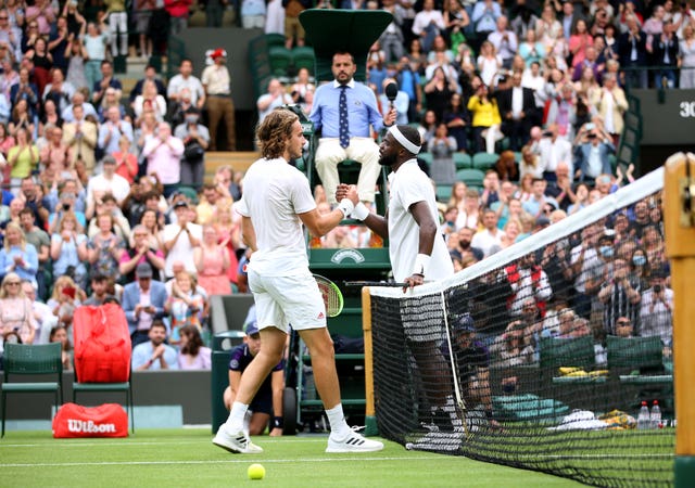 Stefanos Tsitsipas embraces Frances Tiafoe