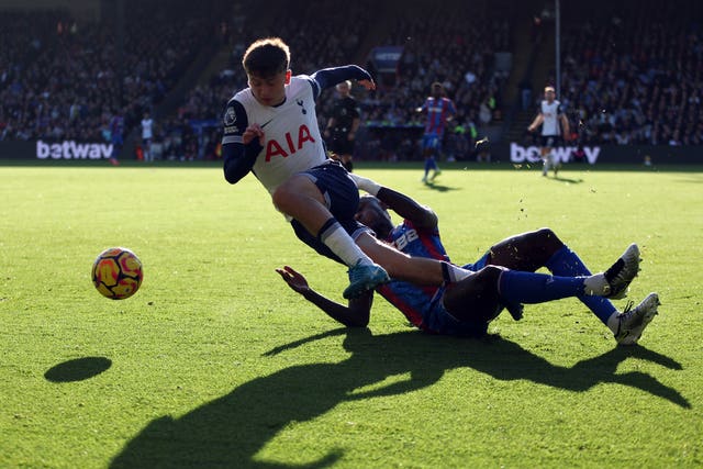 Tottenham's Mikey Moore (left) and Crystal Palace's Trevoh Chalobah battle for the ball at Selhurst Park