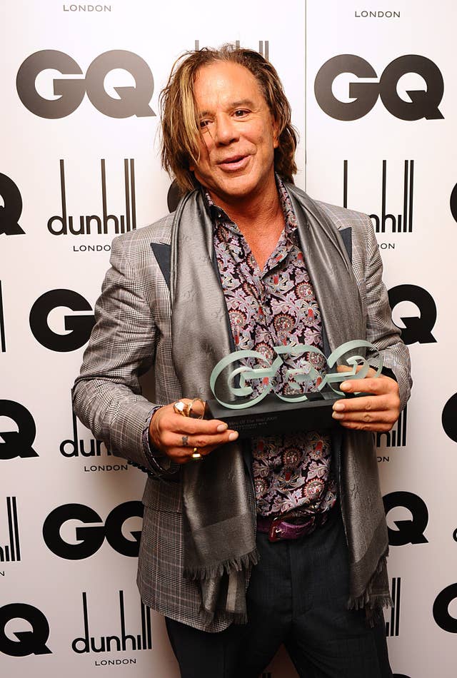 Mickey Rourke with his International Male award at the 2009 GQ Men of the Year Awards