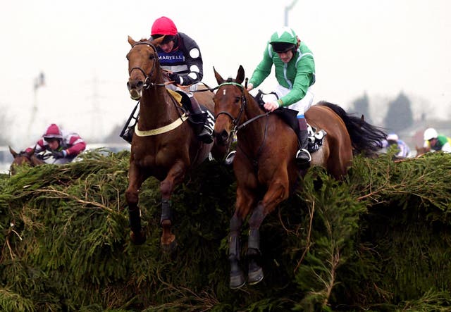 Papillon (right) and Ruby Walsh jump the last on their way to landing the 2000 Grand National
