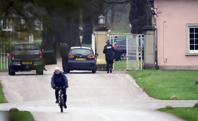 A police officer at the gates at Royal Lodge