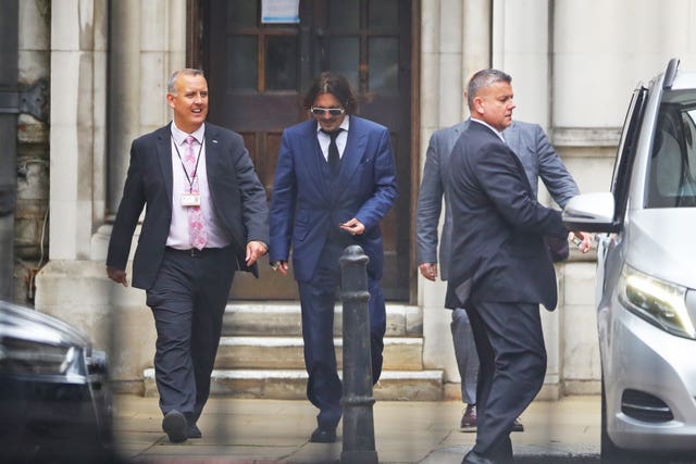 Actor Johnny Depp leaves the High Court in London 