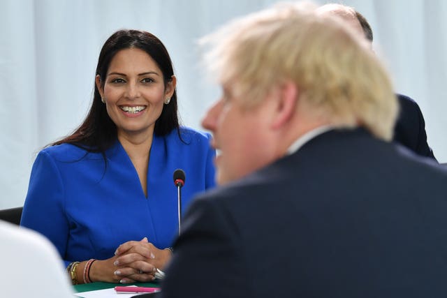 Boris Johnson and Priti Patel