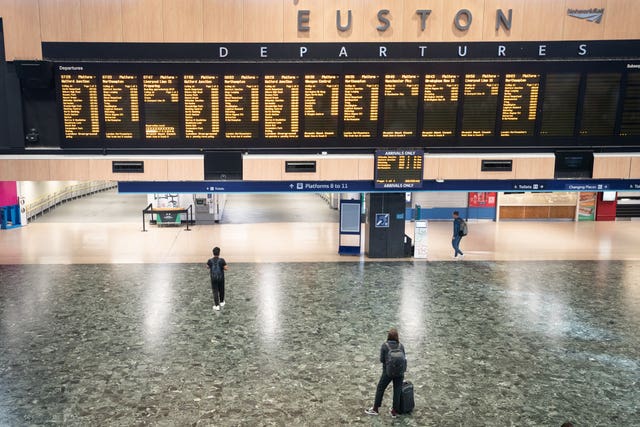Passengers at Euston Station in London