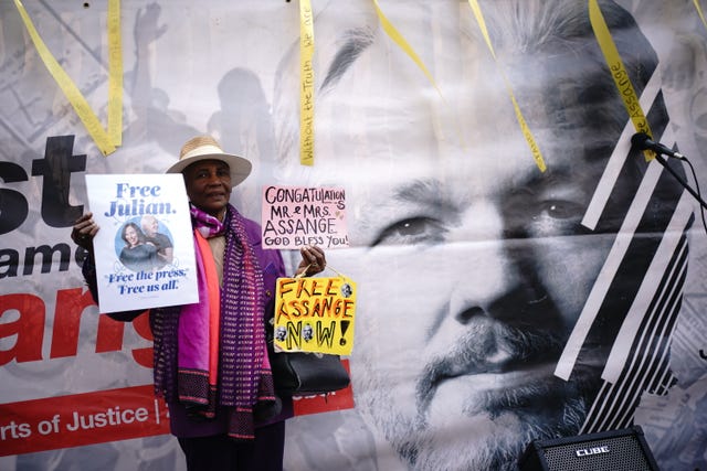 Supporters of WikiLeaks founder Julian Assange celebrate his wedding