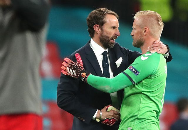 Gareth Southgate, left, consoles Denmark goalkeeper Kasper Schmeichel after the UEFA Euro 2020 semi-final