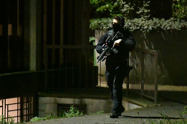 An armed police officer outside London Central Mosque, near Regent’s Park 