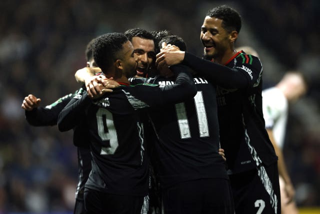 Gabriel Jesus hugs team-mates after his goal