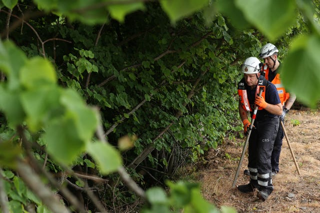 Community Rescue Service volunteers in thick undergrowth near the River Braid in Ballymena