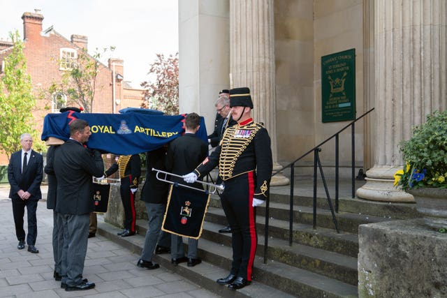 The coffin of D-Day veteran Joe Cattini is carried into church