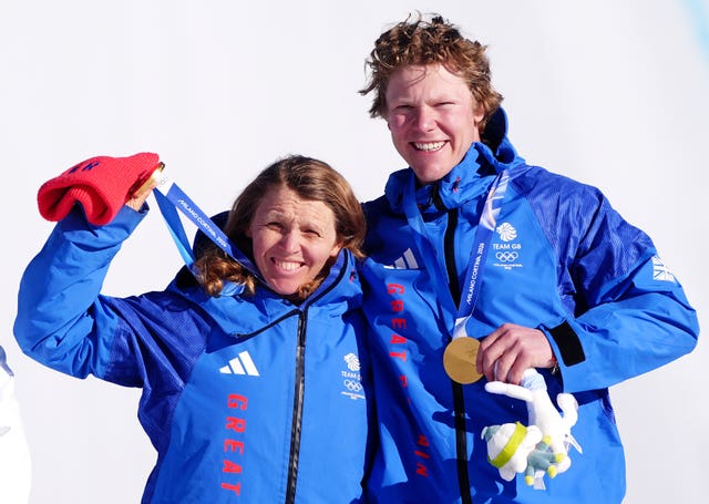 Great Britain’s Charlotte Bankes and Huw Nightingale celebrate with their gold medals