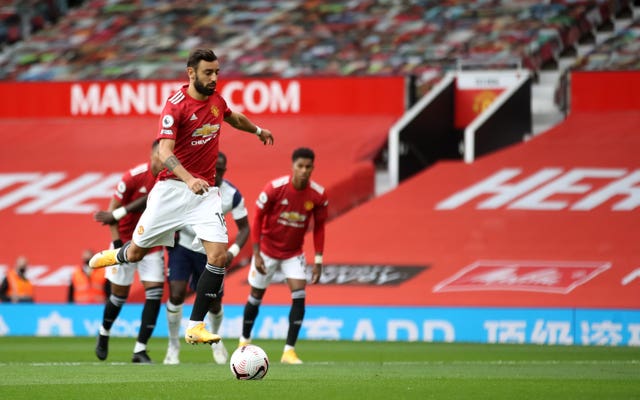 Manchester United's Bruno Fernandes takes a penalty against Tottenham