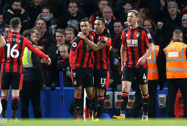 Junior Stanislas, centre left, celebrates his goal