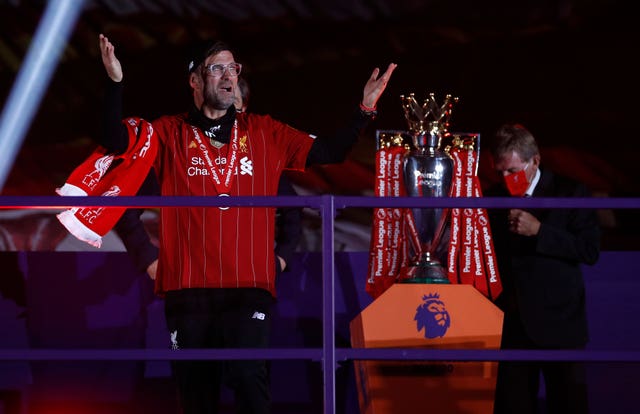 Jurgen Klopp beside the trophy at Liverpool's 2019-20 Premier League title celebration
