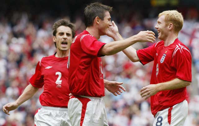 Gary Neville, Frank Lampard and Paul Scholes celebrate a goal