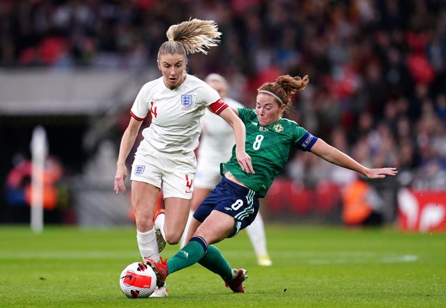 Northern Ireland captain Marissa Callaghan, right, puts in a tackle on Leah Williamson