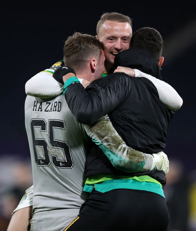 Conor Hazard hugs his team-mates