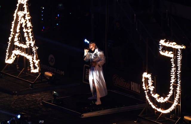 Anthony Joshua makes his way to the ring ahead of his bout with Oleksandr Usyk at the Tottenham Hotspur Stadium. Joshua, defending his WBA, WBO, IBF and IBO titles, was outfought by his wily opponent and lost on a unanimous points decision 