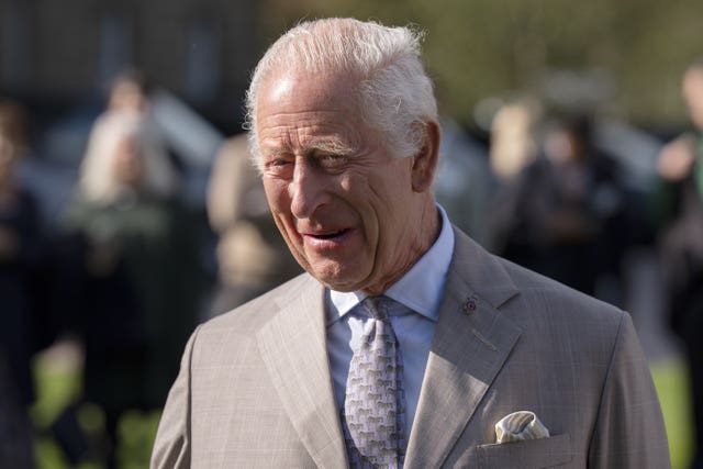 The King smiles on a visit to Dumfries House