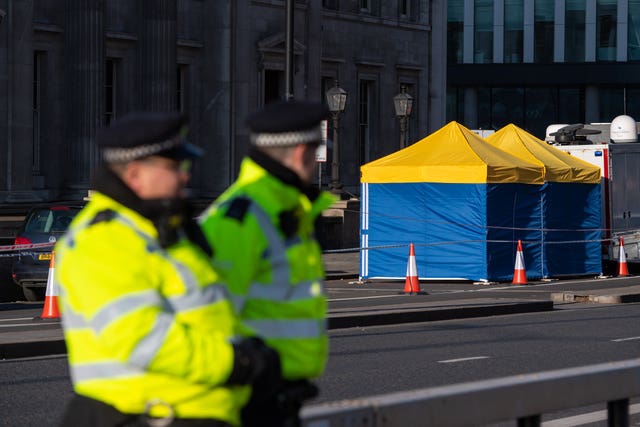 Police tents outside Fishmongers' Hall, on London Bridge, following the terror attack