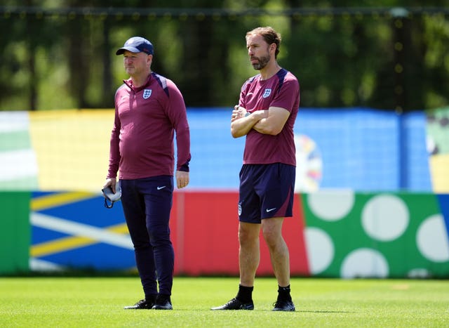 Steve Holland, left, and Gareth Southgate on the training pitch 