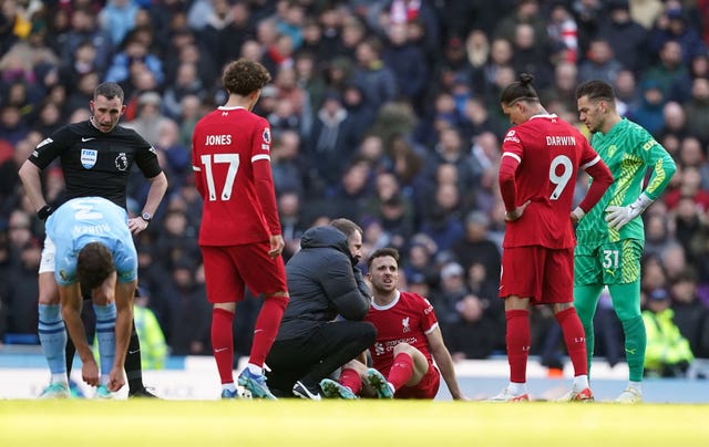 Liverpool’s Diogo Jota sits injured