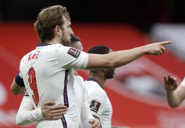 Harry Kane celebrates scoring England's first in Tirana