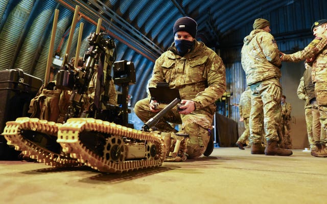 Members of the British military at RAF Leeming prepare for Exercise Hyperion Storm 