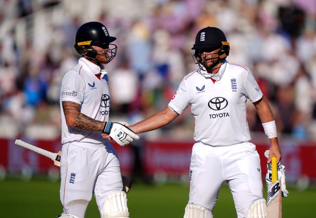 England’s Joe Root and Ben Stokes on the first day